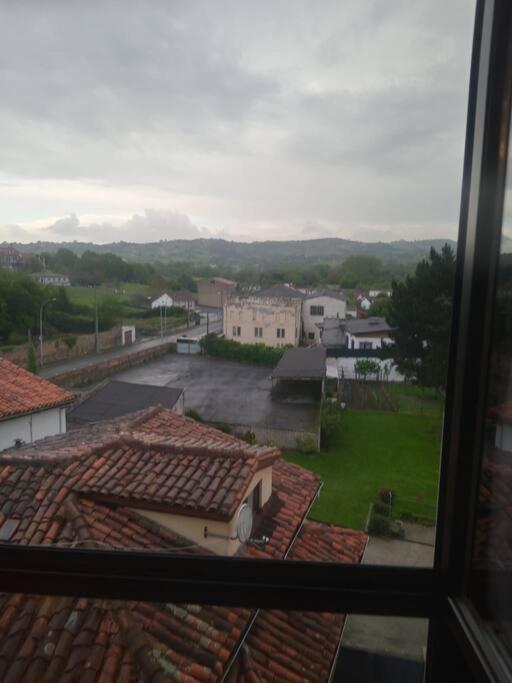 Acogedor En *