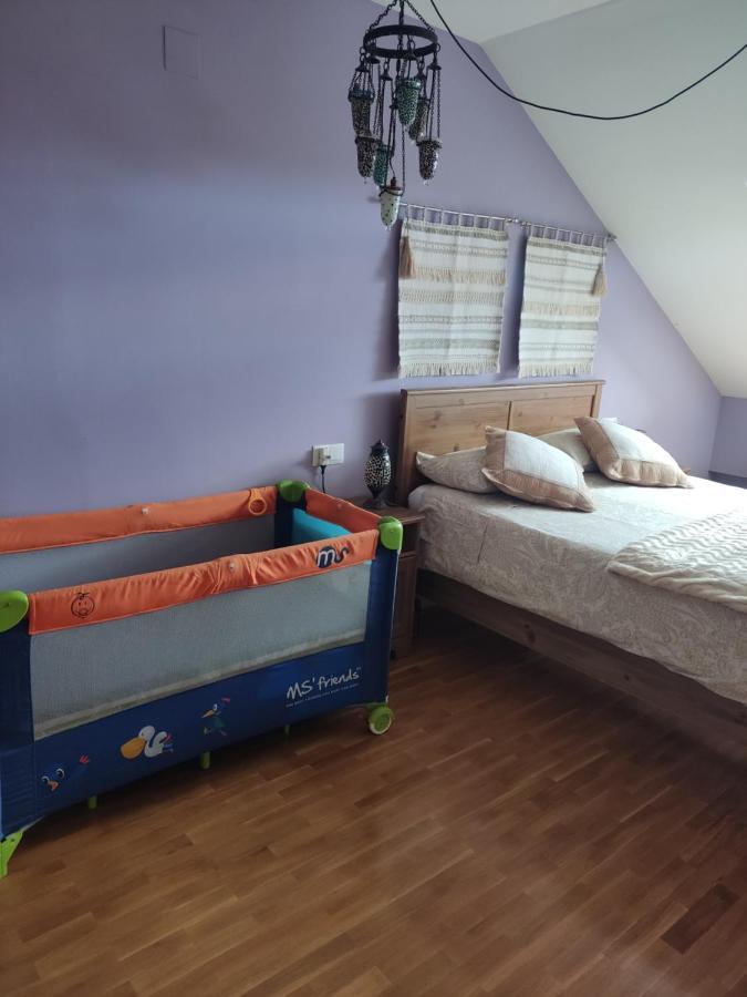 Acogedor En *